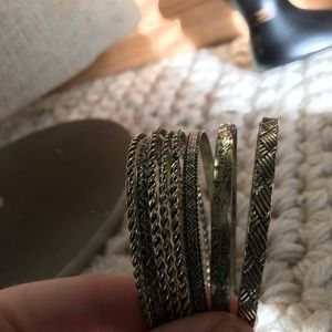 Set of gold bracelets.